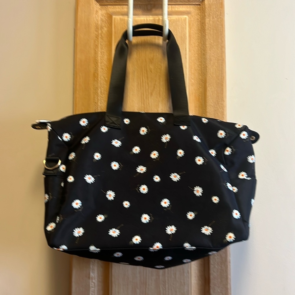Alice + Olivia by Stacey Bendet canvas duffel bag.